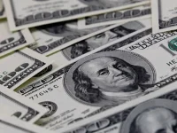 Dólar cai para R$ 5,16 à espera de dados nos Estados Unidos