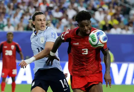 Soccer Football - FIFA World Cup 2026 - Group H -  Uruguay v Cape Verde - Miami Stadium, Miami Gardens, Florida, U.S. - June 21, 2026 Cape Verde's Diney Borges in action with Uruguay's Agustin Canobbio REUTERS/Amanda Perobelli
