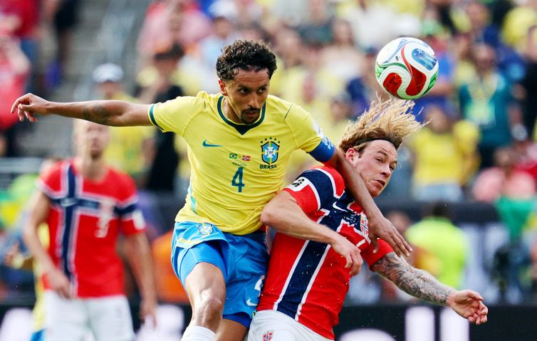 Soccer Football - FIFA World Cup 2026 - Round of 16 - Brazil v Norway - New York New Jersey Stadium, East Rutherford, New Jersey, U.S. - July 5, 2026 Brazil's Marquinhos in action with Norway's Patrick Berg IMAGN IMAGES via Reuters/Vincent Carchietta
