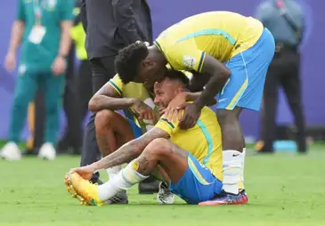 Soccer Football - FIFA World Cup 2026 - Round of 16 - Brazil v Norway - New York New Jersey Stadium, East Rutherford, New Jersey, U.S. - July 5, 2026
Brazil's Neymar, Raphinha and Vinicius Junior look dejected after the match as Brazil are eliminated from the World Cup IMAGN IMAGES via Reuters/James Lang
